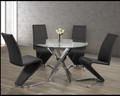 Ensemble de salle à manger rond en verre avec chaises noires en forme de Z