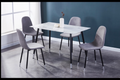 Ensemble de salle à manger blanc avec chaises rembourrées grises
