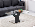 Table basse moderne en verre avec pied sculptural noir